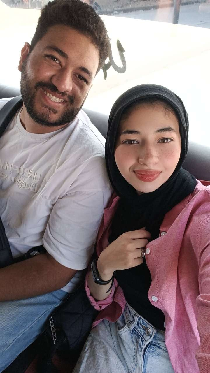 Arwa and me sitting together, a photograph from our time as a couple.